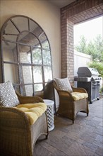 View of sitting area with barbecue at patio