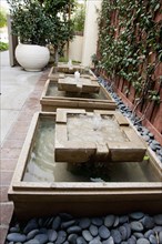 Fountains outside house