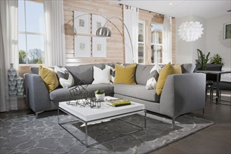 Sectional sofa and coffee table in contemporary living room