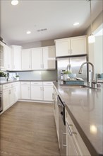 Kitchen island and cabinets in domestic kitchen