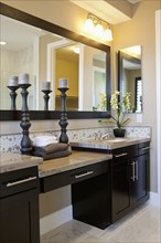 Interior of domestic bathroom with candlestick holders