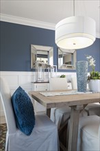 Pendant light above dining table