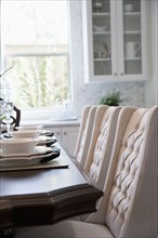 Close-up of place setting on dining table at home