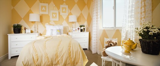Bright yellow kid's bedroom