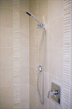 Tile shower with modern shower head