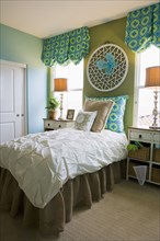 Girls bedroom with green and blue accents