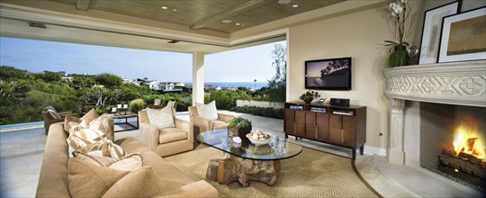 Contemporary living room with view of ocean