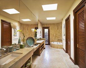 Large master bathroom with long vanity