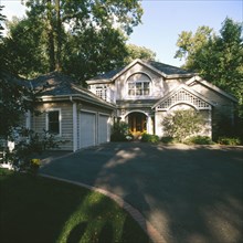 Exterior of traditional house with garage