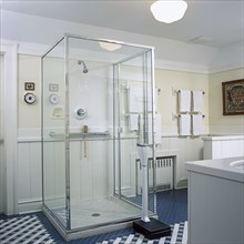 View towards glass box shower stall