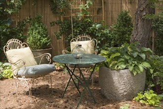 Pine needles create a patio base for a seating area