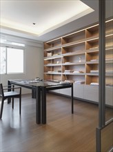 Modern home office with shelves