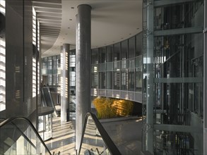 View down escalator in modern lobby