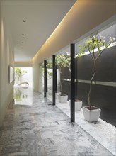 Marble hallway with glass walls