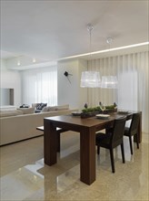 Modern dining area with marble floors