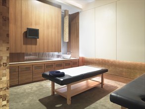 Spa room with massage table