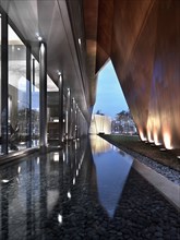Reflecting pool along modern building