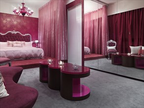 Elegant pink and red master bedroom