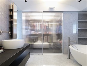 Marble walls in modern bathroom
