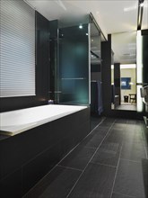 Detail of black tile in modern bathroom
