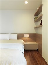 Simple modern bedroom with hardwood floor