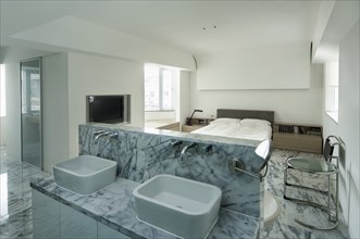 Sinks on marble counter top in master bedroom