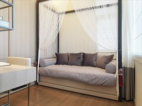 Contemporary daybed with mosquito net