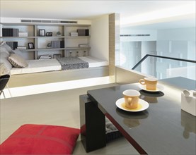 Modern loft with bed and dining table