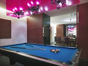Pool table in modern home