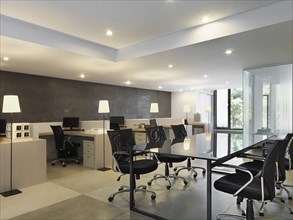 Workspaces and conference table in modern office
