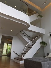 Staircase to upstairs in large modern home