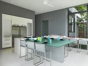 Frosted glass dining table in modern dining room