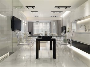 Glass dining table in modern home