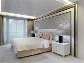 Elegant bedroom with printed wall paper