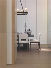 Dining table and hardwood floors in modern dining room