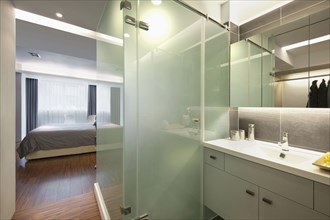 Bathroom off bedroom in modern home