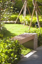 Wooden bench in garden