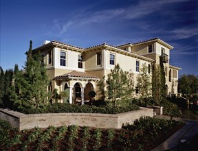 Front exterior contemporary Italianate style home