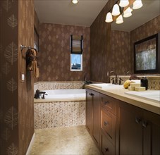 Elegant Bathroom with Leaf Wallpaper