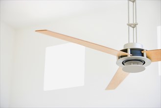 Modern Ceiling Fan in White Room