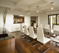 Modern White Dining Room with Hardwood Floors