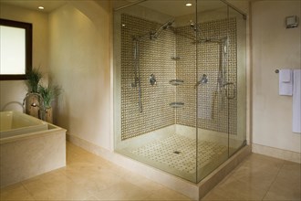 Modern seamless glass shower with double shower heads