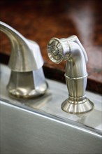 Stainless steel kitchen sink faucet and sprayer