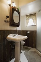 Small bathroom with a pedestal sink