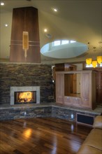 Traditional living room with stone fireplace