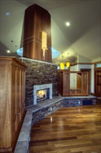Traditional living room with stone fireplace