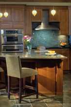 Kitchen island with dining counter stool