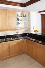 Cabinets and counters in modern kitchen