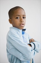 African boy with arms crossed