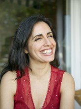 Close up of smiling mixed race woman